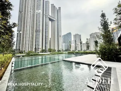 a swimming pool in a city with tall buildings at KaMi Mont Kiara Residences & Hotel by Ireka in Kuala Lumpur