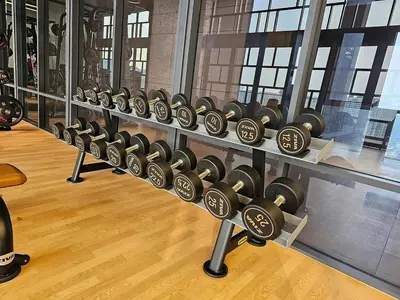 a row of dumbbell racks in a gym at Societe Hartamas, Mont Kiara, Kuala Lumpur Golf in Kuala Lumpur