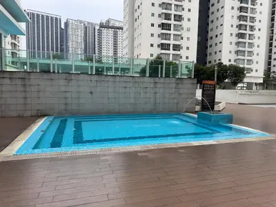 a swimming pool in a city with tall buildings at Maxim City Lights in Kuala Lumpur
