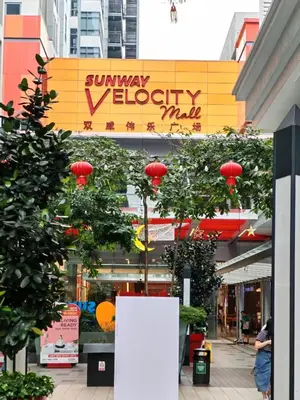 a shopping mall with red lanterns in a city at Sunway Velocity Two Direct Link to Sunway Velocity Mall MRT TRX in Kuala Lumpur