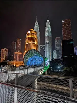 a view of a city skyline at night at Legasi 3 Premium Bedroom With KLCC View 10min Walk to KLCC Comes With Board Games and PS4 Fit Up To 10PAX in Kuala Lumpur
