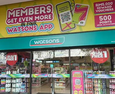 a store with signs on the front of a store at MCity Studio With Balcony, Near KLCC, Gleneagles Hosp, Ampang Puteri Hosp in Kuala Lumpur
