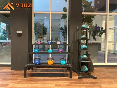 a shelf with colorful vases on it in a store at Luxury and Cozy Suite KL and 118 TOWER View Netflix 1080HD in Kuala Lumpur
