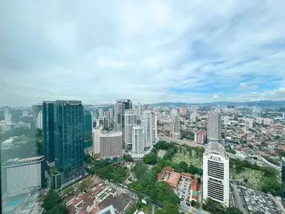 an aerial view of a city with tall buildings at Sky Suites Luxury unit with KLCC view in Kuala Lumpur