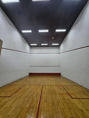 an empty gymnasium with a wooden floor and ceiling at X'Apartelle near Pusat Bandar Damansara MRT in Kuala Lumpur