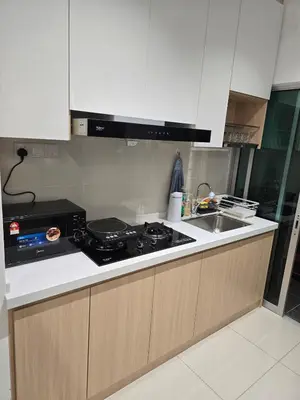 a kitchen with a stove and a sink at Razak Residence B2-43 RC Kuala Lumpur in Kuala Lumpur