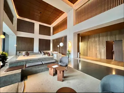 a living room with a couch and a table at KL Sentral Service Apartment-The Establishment KL Sentral EST in Kuala Lumpur