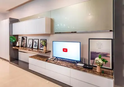 a computer monitor on a counter in a room at Dorsett Bukit Bintang 5min to Pavilion KL in Kuala Lumpur
