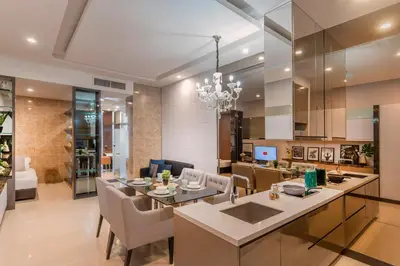 a kitchen and dining room with a table and chairs at Dorsett Bukit Bintang 5min to Pavilion KL in Kuala Lumpur