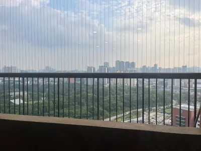 a view of a city from a balcony at Vista Sentul Residence in Kuala Lumpur