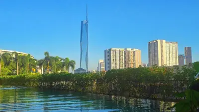 a view of a city skyline with a tall tower at Trion KL Service Suite - Modern City Stay with Pool & Gym in Kuala Lumpur
