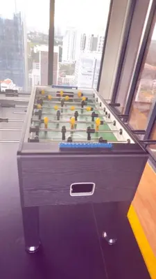 a pool table in a room with at Majestic Alaman Suites KLCC in Kuala Lumpur