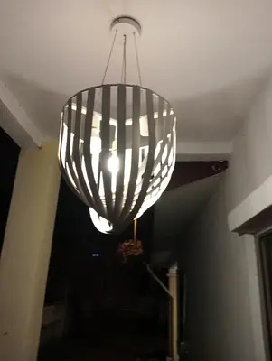 a chandelier hanging from a ceiling in a room at have fun staying here in Kuala Lumpur