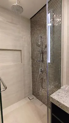 a shower with a glass door in a bathroom at Star Residence KLCC By LLKOK in Kuala Lumpur