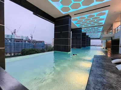 a pool on the roof of a building at Service Apartment Sunway Velocity in Kuala Lumpur