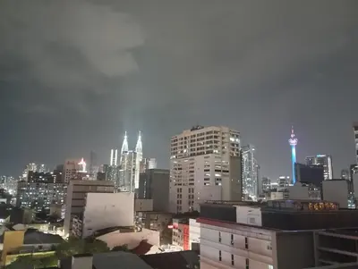 a view of a city skyline at night at Chamber suites KLCC by Global stay in Kuala Lumpur