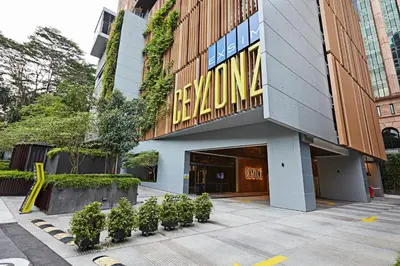 a building with a sign on the side of it at Ceylonz Suites KLCC by WSD in Kuala Lumpur