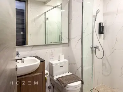 a bathroom with a shower and a toilet and a sink at SBR1B Hozem KL2601 Apartment Bukit Bintang in Kuala Lumpur