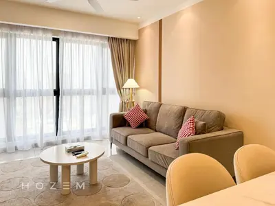 a living room with a couch and a table at 2BR1B Hozem KL4409 Apartment Bukit Bintang in Kuala Lumpur