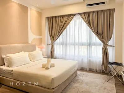 a bedroom with a bed and a large window at 2BR1B Hozem KL4409 Apartment Bukit Bintang in Kuala Lumpur