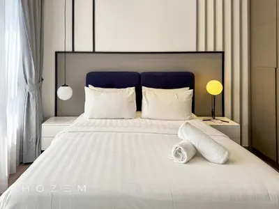 a bedroom with a large white bed with white pillows at 2BR2B Hozem KL2708 Apartment Bukit Bintang in Kuala Lumpur