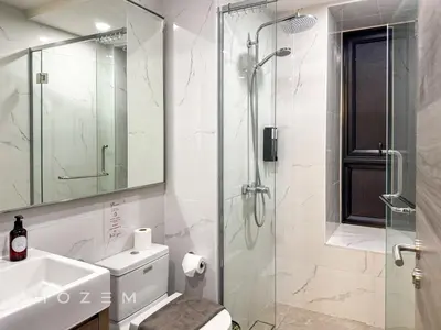 a bathroom with a shower and a toilet and a sink at 2BR2B Hozem KL1812 Apartment Bukit Bintang in Kuala Lumpur