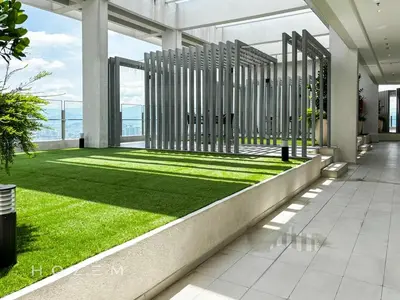 a room with a green lawn in a building at 2BR2B Hozem KL4906 Apartment Bukit Bintang in Kuala Lumpur
