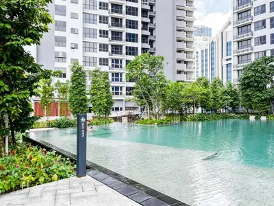 a swimming pool in a city with tall buildings at 2BR2B Hozem KL1713 Apartment Bukit Bintang in Kuala Lumpur