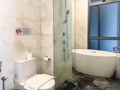 a bathroom with a toilet and a shower and a sink at 2BR2B Hozem KL5009 Apartment KLCC in Kuala Lumpur