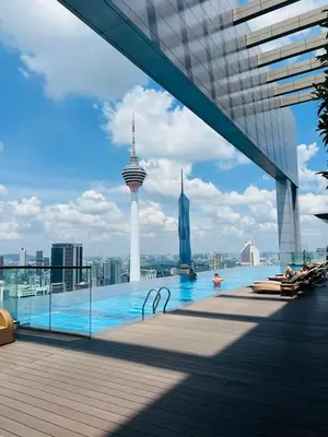 a pool on a building with a view of the city at The Platinum Suites KLCC in Kuala Lumpur
