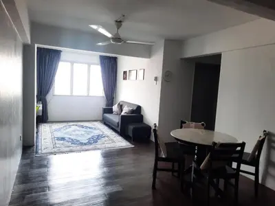 a living room with a couch and a table at Homestay Lala in Kuala Lumpur