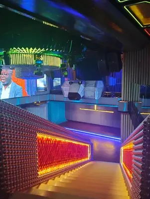a bowling alley with red and blue lights at KLCC Sky villa Suites Platinum by MiM in Kuala Lumpur