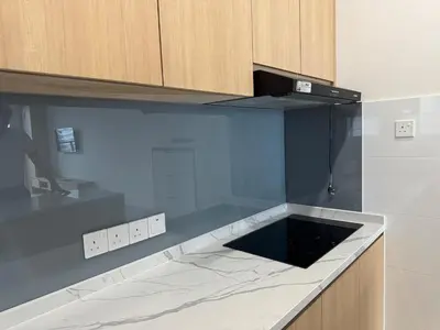 a kitchen with a black and white counter top at Mont kiara warmly 6 pax stay in Kuala Lumpur