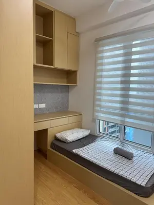 a small room with a window with a bed next to it at Mont kiara warmly 6 pax stay in Kuala Lumpur