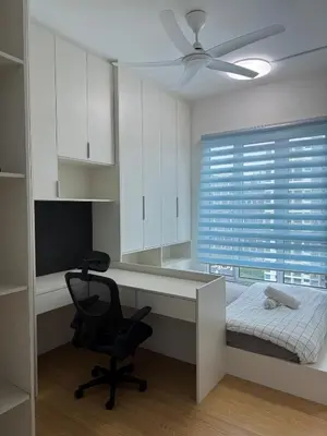 a bedroom with a desk and a chair and a window at Mont kiara warmly 6 pax stay in Kuala Lumpur