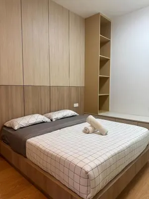 a bedroom with a bed with a teddy bear on it at Mont kiara warmly 6 pax stay in Kuala Lumpur