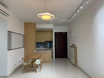 a dining room and kitchen with a table and chairs at Mont kiara warmly 6 pax stay in Kuala Lumpur