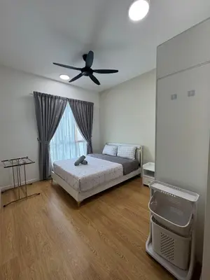 a bedroom with a bed and a ceiling fan at 3Room 5 Pax stay in Mont Kiara in Kuala Lumpur