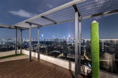 a view of a city skyline from the top of a building at Cozy Stay in KLCC\u5409\u9686\u73bb in Kuala Lumpur