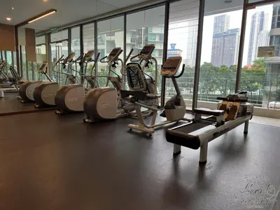a row of cardio machines in a gym at Cozy Minimalist Condo In The Heart of Kuala Lumpur City 1BR in Kuala Lumpur