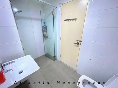 a bathroom with a shower and a sink and a toilet at Parc 3 KL South Cozy Apartment, Walking Distance to AEON Maluri & Sunway Velocity in Kuala Lumpur