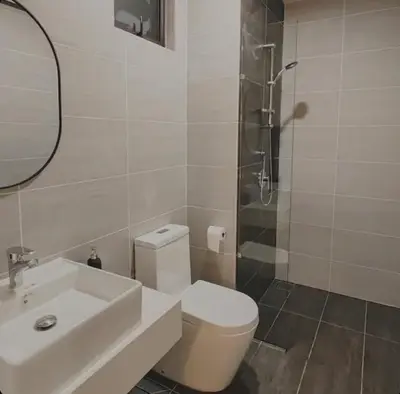 a bathroom with a toilet and a sink and a shower at TrionKL Luxury Stay 2BR Free Wi-Fi 10min to KLCC - Chinese Host in Kuala Lumpur