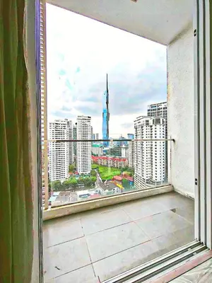 a view of a city skyline from a window at One Bukit Ceylon KLCC in Kuala Lumpur