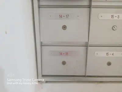 a group of drawers with numbers on them at Male Room at Plaza Rah, KL City Centre in Kuala Lumpur