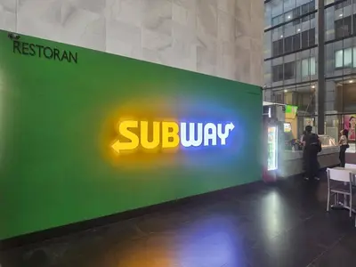 a sign for a sullivan company in a building at Maytower Apartment Studio Kuala Lumpur in Kuala Lumpur