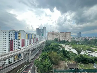 a view of a city with a bridge and buildings at Arte Plus Ampang By Comfortcorner in Kuala Lumpur