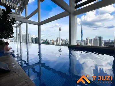 a swimming pool with a view of the city at KL &118 Tower View 1R1B Netflix 19F & Best View Infinity Pool in Kuala Lumpur