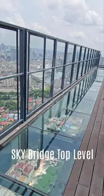 an observation deck on the sky bridge top level at View KLCC 3 Bedroom Homestay Kenwingston Platz in Kuala Lumpur