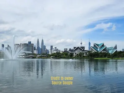 a view of a city from across a body of water at View KLCC 3 Bedroom Homestay Kenwingston Platz in Kuala Lumpur
