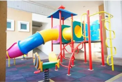 a childrens play area with a colorful playground at Seri Bukit Ceylon Dreamy Destiny luxe Suites in Kuala Lumpur